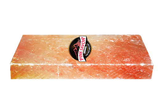 Natural pink salt tile, 8" x 4" x 2", elegant and air-purifying addition to any space.
